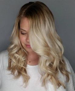 Curly Blonde with a Side Part